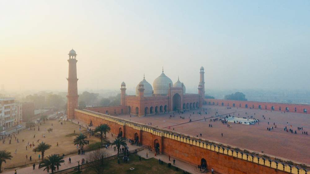Aerial view of Badshahi Mosque, Lahore, seen in the morning mist