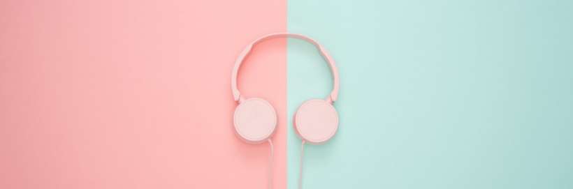 headphones on a pastel backdrop